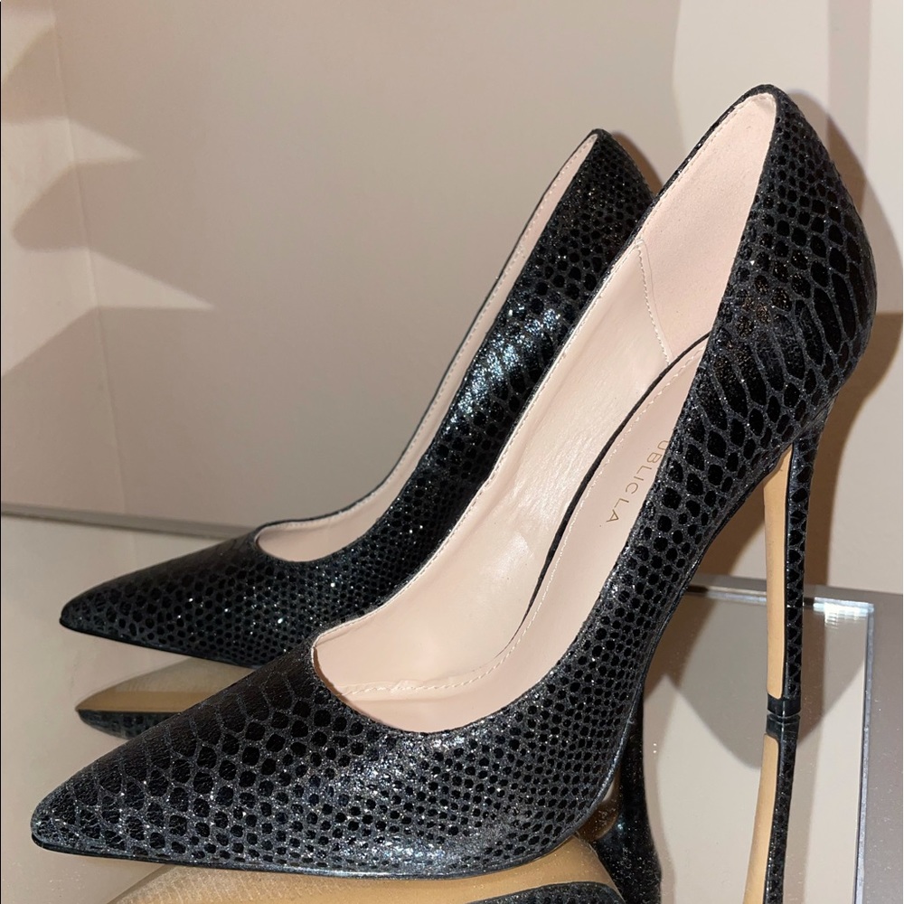 Black pointed toe heels